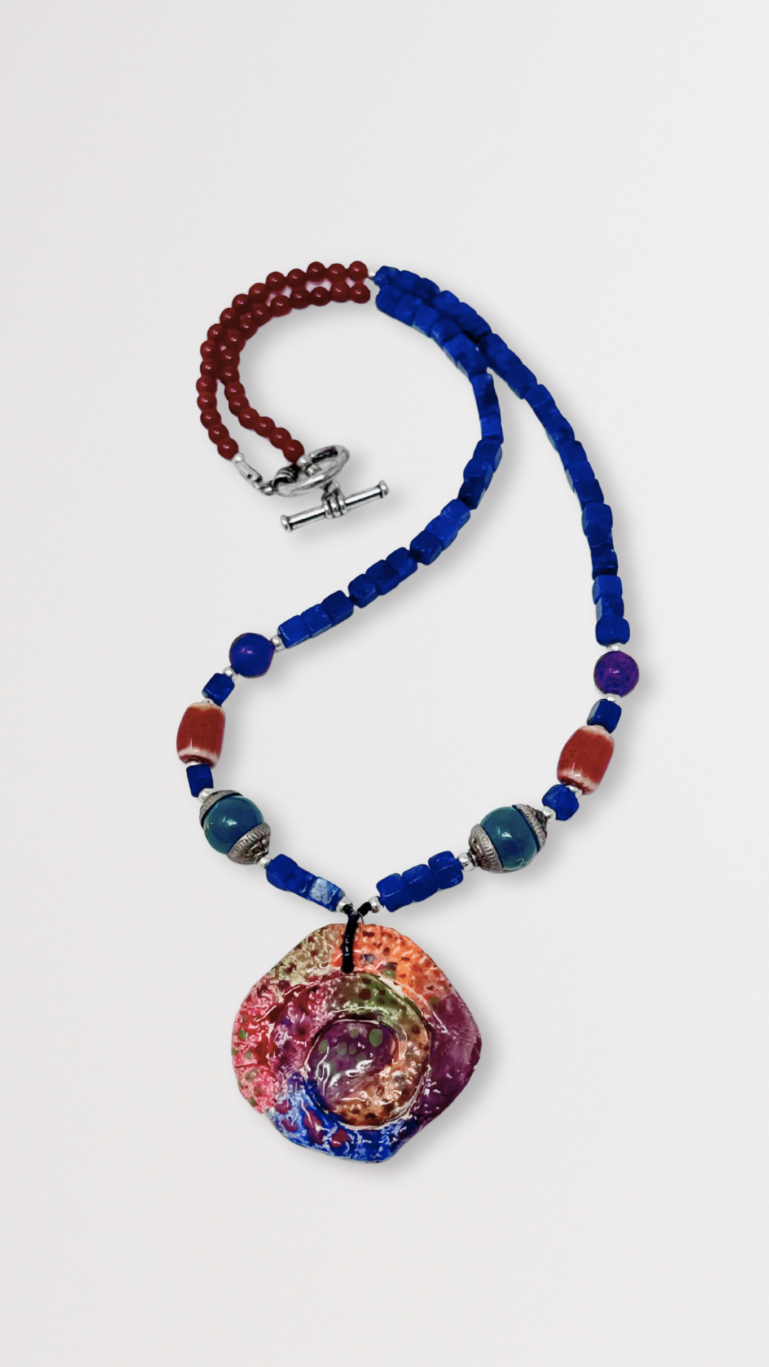 Beaded Necklace with Ceramic Swirl Pendant